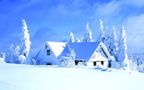 Снігова шапка на даху будинку - ідеальний утеплювач
