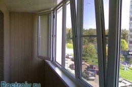 Утеплений балкон з пластиковими вікнами - Фото